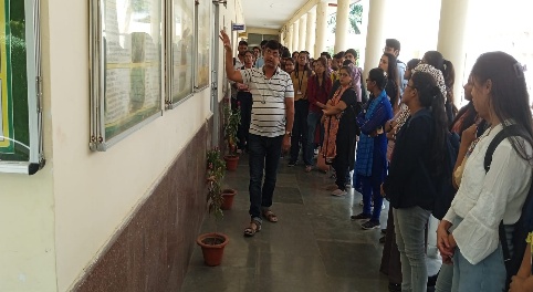 Group of visiting students with institute staff