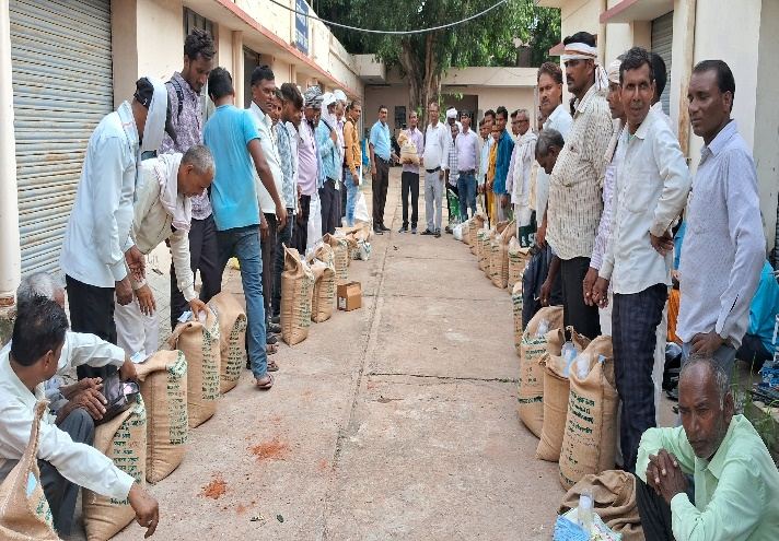 Jute bags of quality pulse seed laid out for distribution to beneficiary farmers